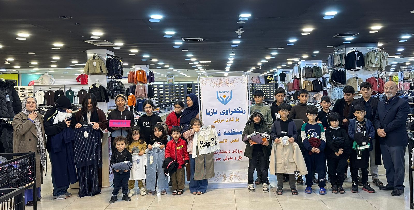 Nazya Humanitarian Aid distributing Eid clothes and gifts to children and families in need in Kurdistan