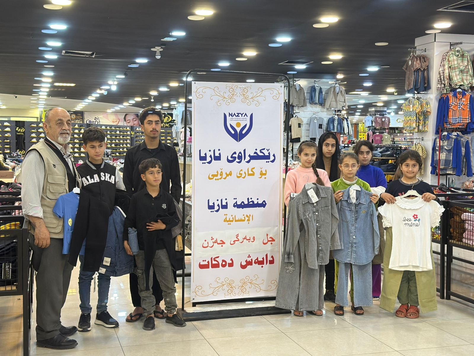 Nazya Humanitarian Aid distributing Eid clothes and gifts to children and families in need in Kurdistan