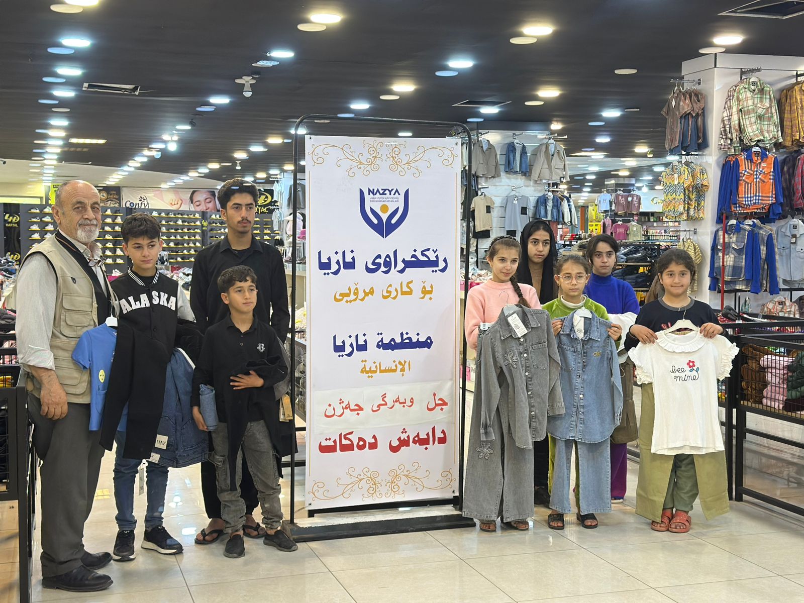 Nazya Humanitarian Aid distributing Eid clothes and gifts to children and families in need in Kurdistan
