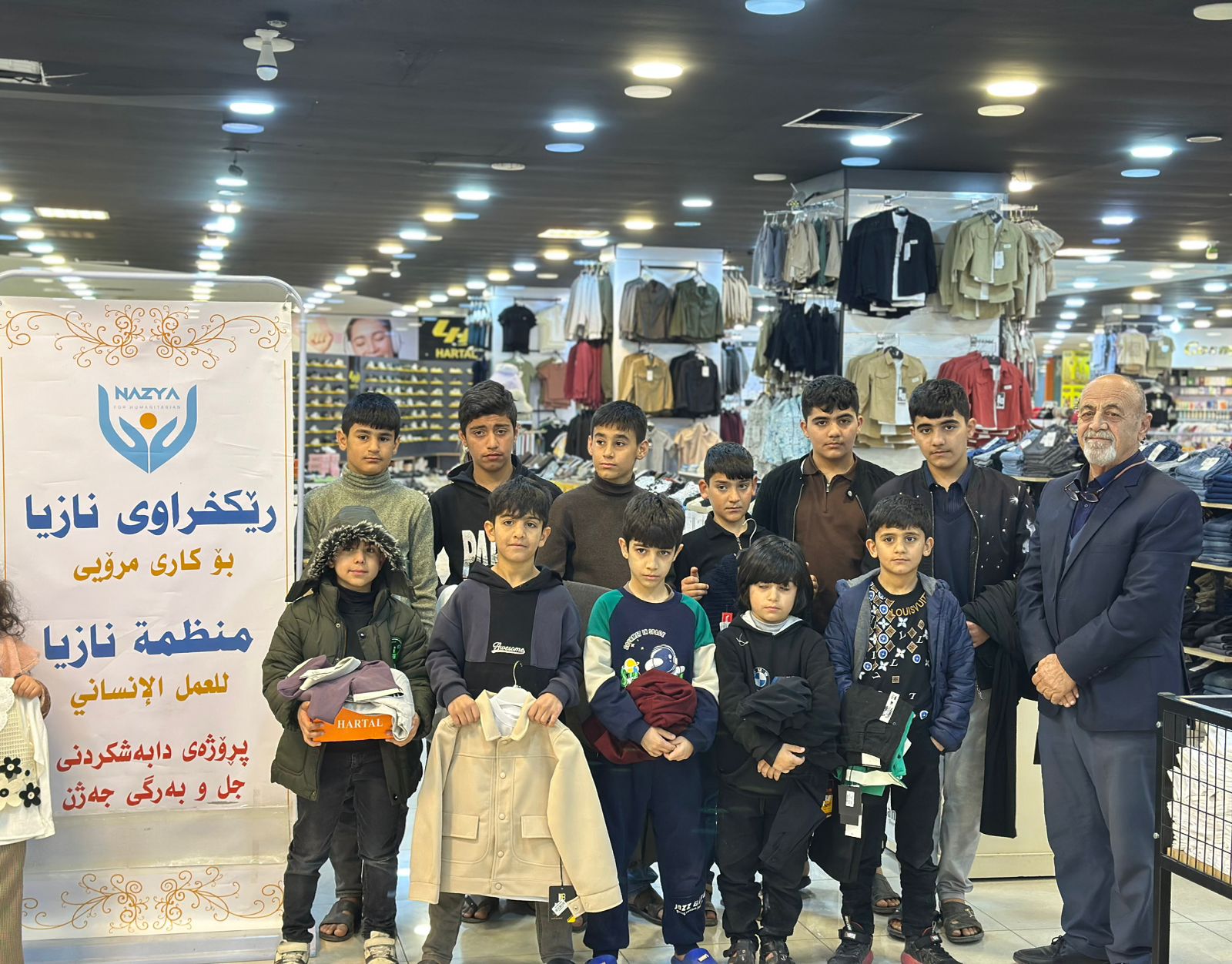 Nazya Humanitarian Aid distributing Eid clothes and gifts to children and families in need in Kurdistan