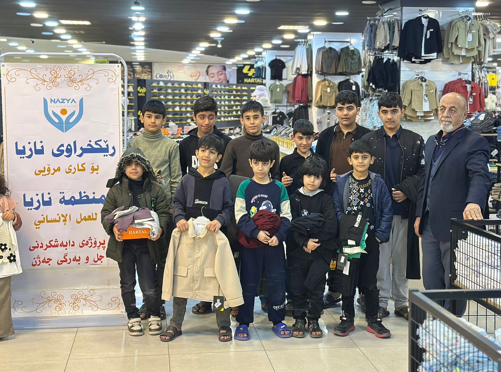Nazya Humanitarian Aid distributing Eid clothes and gifts to children and families in need in Kurdistan