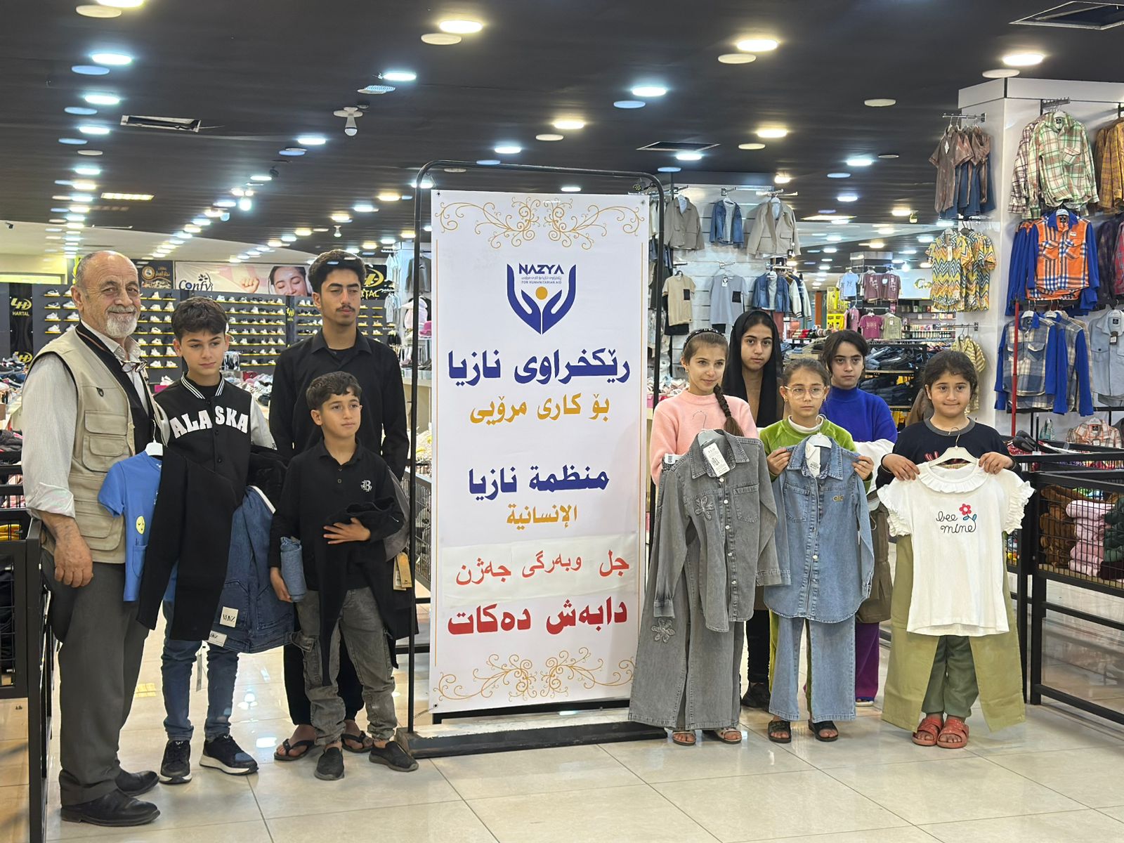 Nazya Humanitarian Aid distributing Eid clothes and gifts to children and families in need in Kurdistan