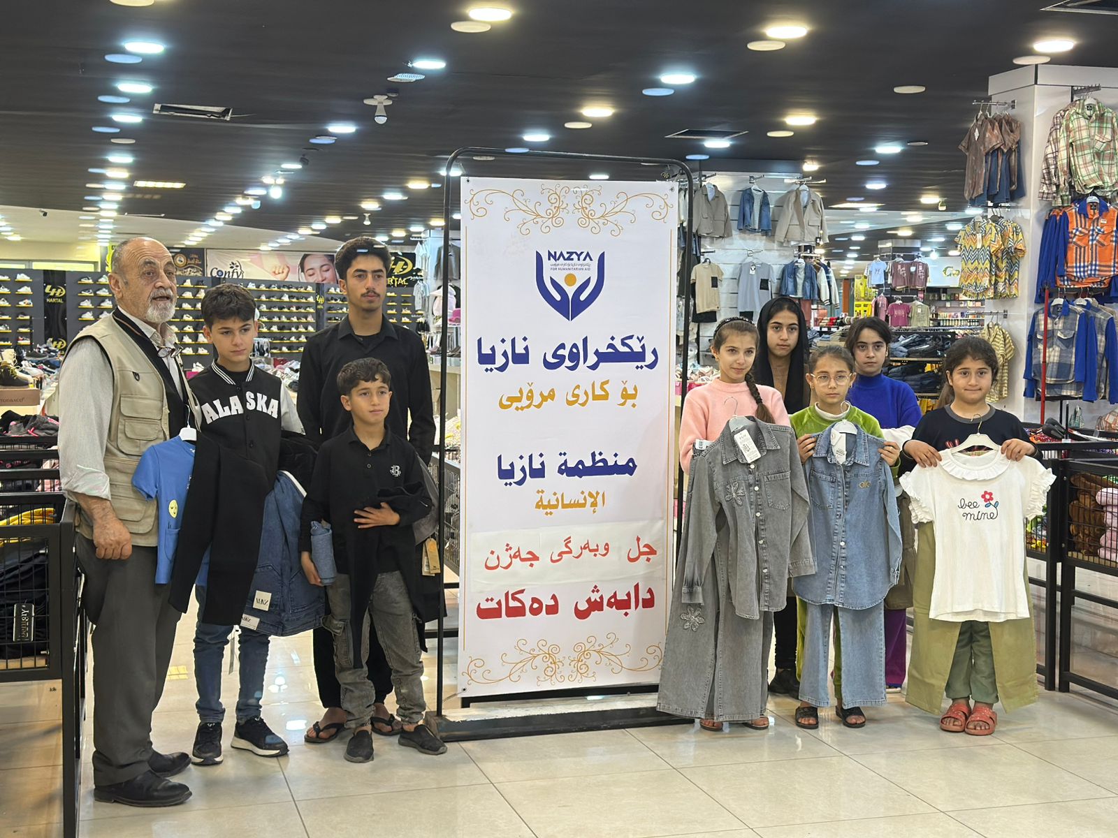 Nazya Humanitarian Aid distributing Eid clothes and gifts to children and families in need in Kurdistan