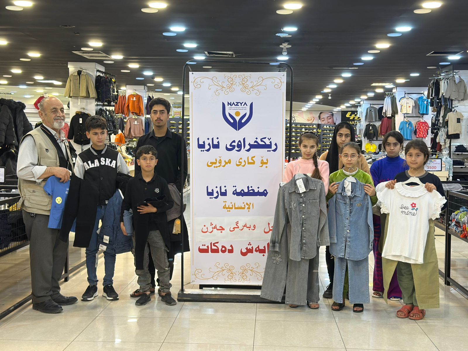 Nazya Humanitarian Aid distributing Eid clothes and gifts to children and families in need in Kurdistan
