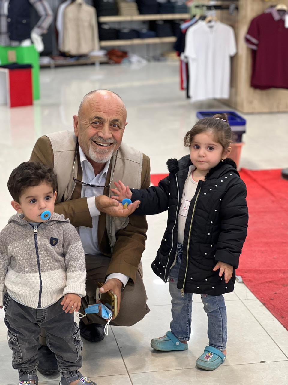 Nazya Humanitarian Aid distributing Eid clothes and gifts to children and families in need in Kurdistan