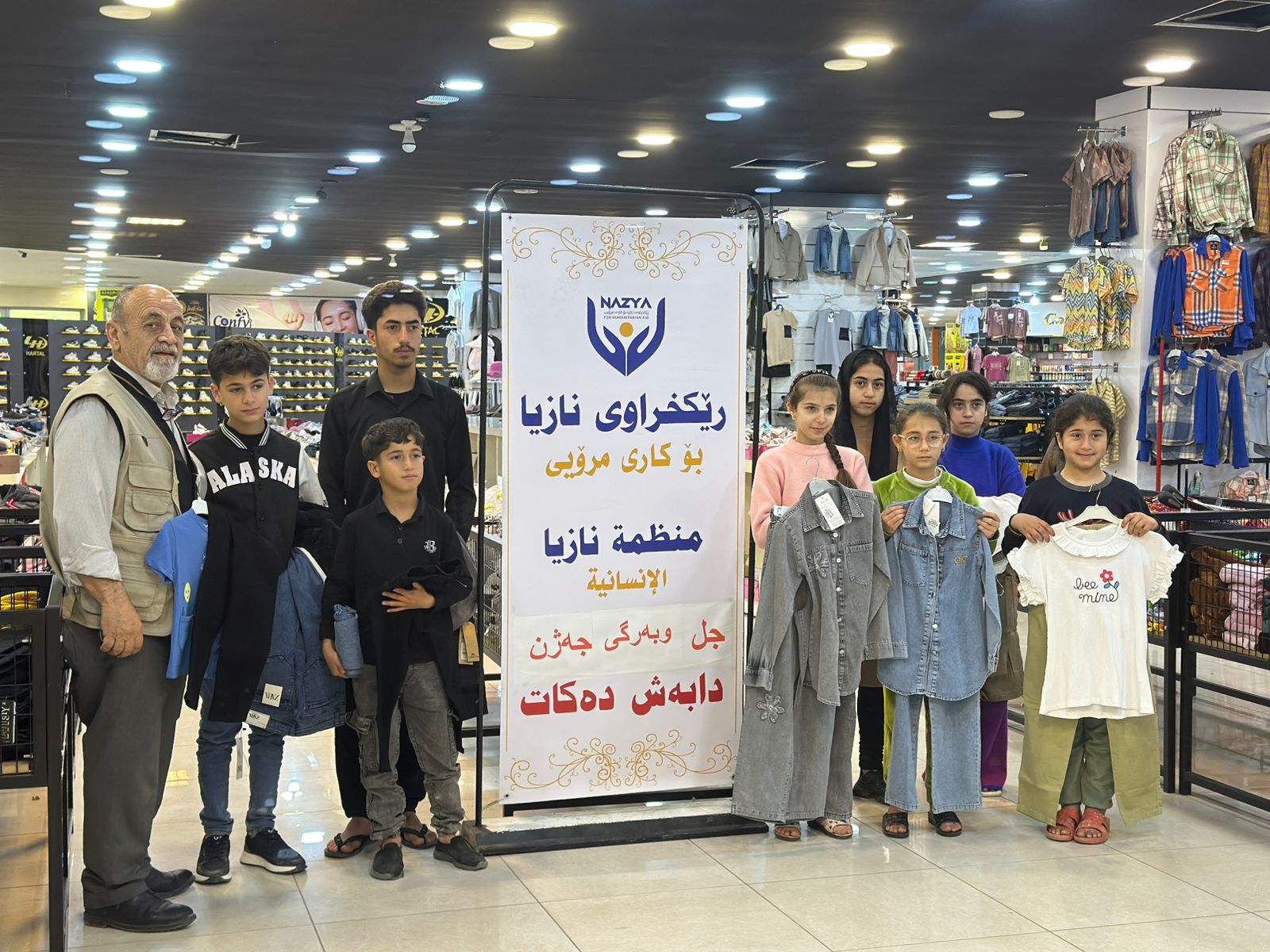 Nazya Humanitarian Aid distributing Eid clothes and gifts to children and families in need in Kurdistan