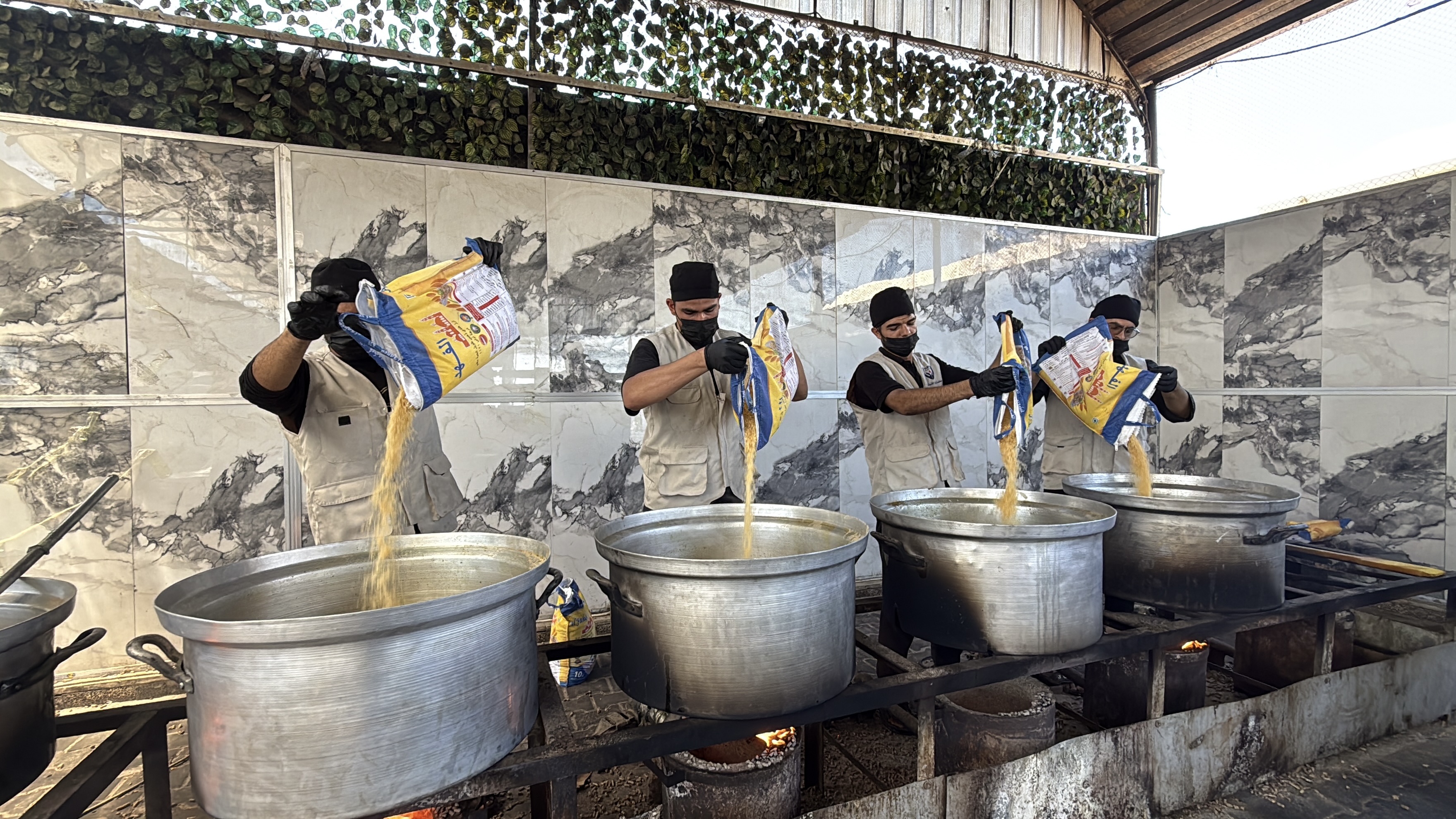 Nazya Humanitarian Aid food aid distribution for Palestinian families | delivering groceries, bread and essential food supplies to people in need in Palestine