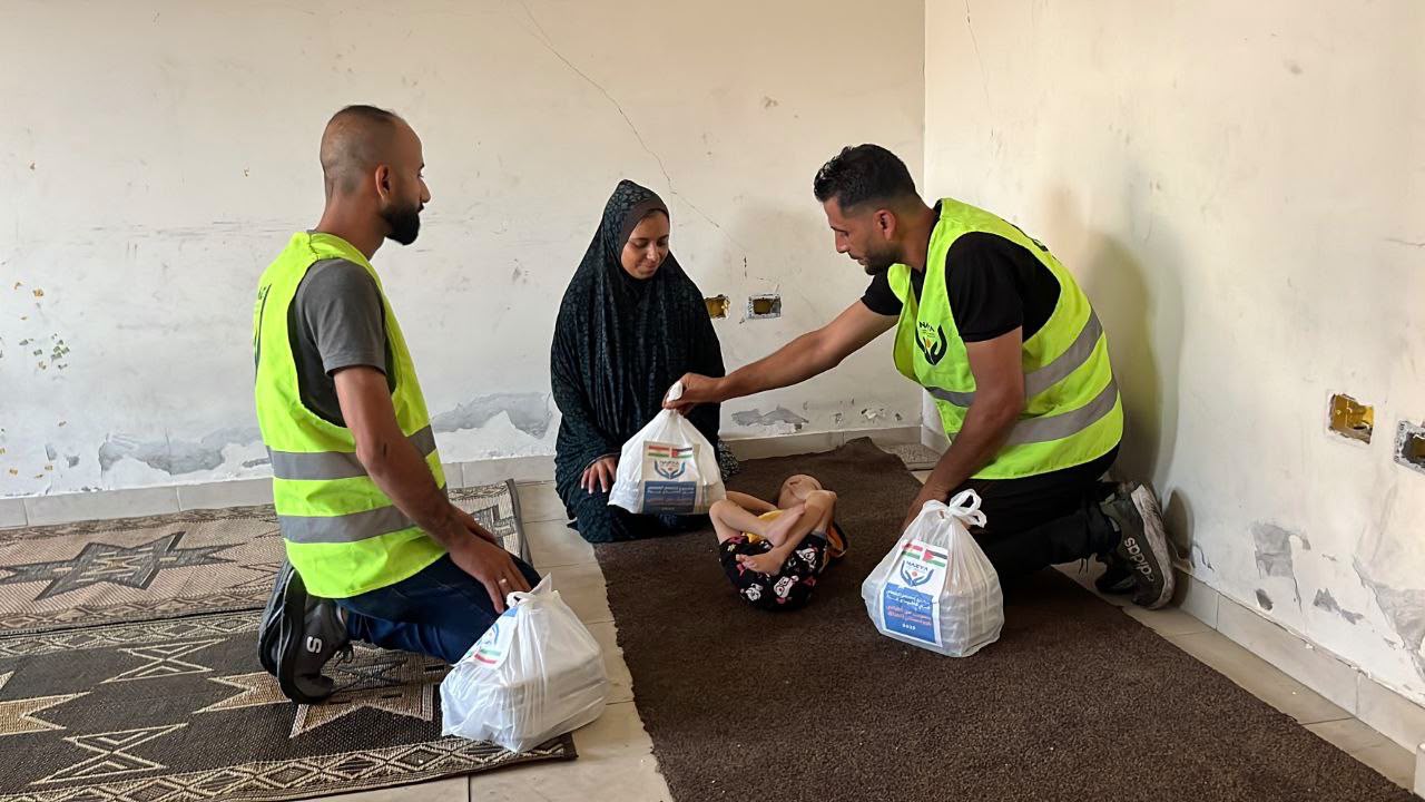 Nazya Humanitarian Aid food aid distribution for Palestinian families | delivering groceries, bread and essential food supplies to people in need in Palestine