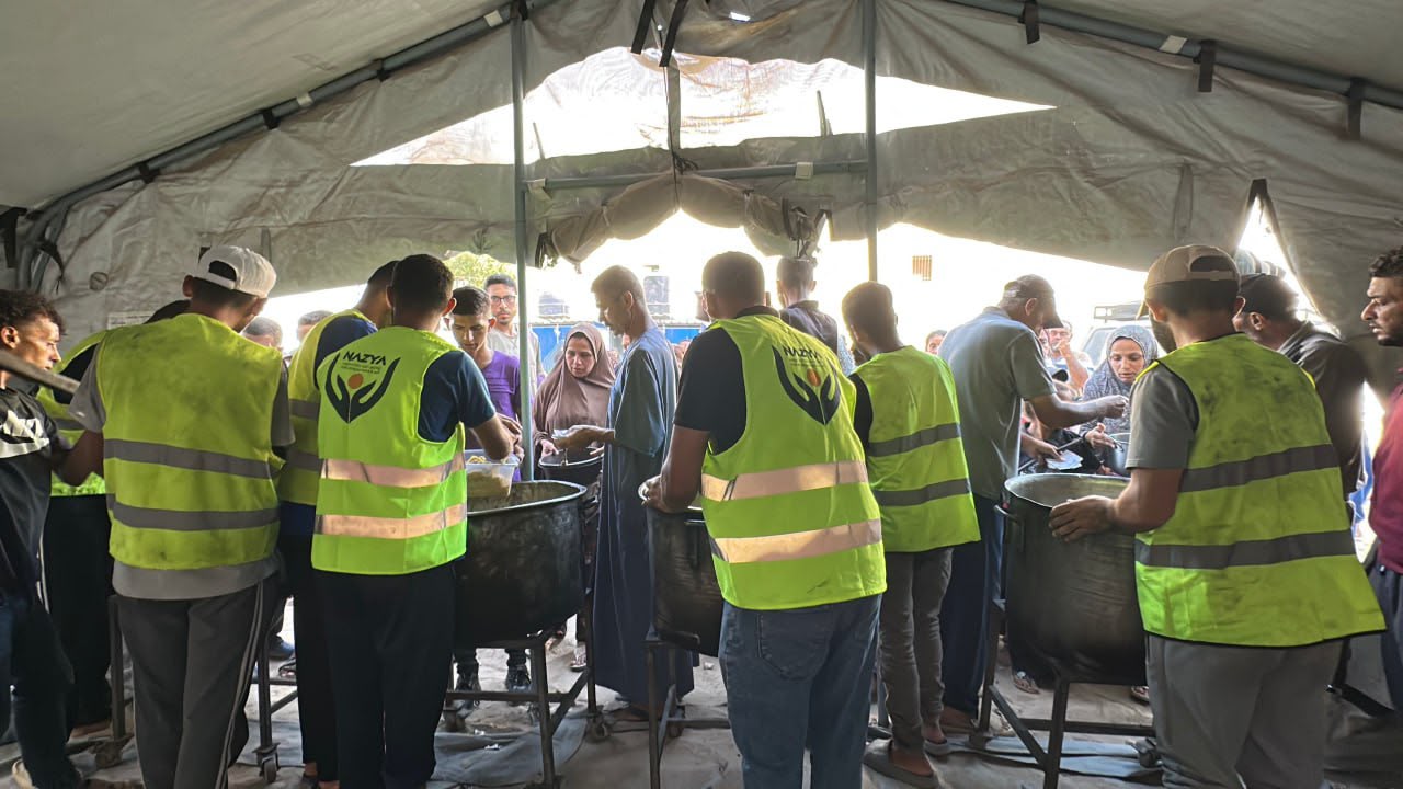 Nazya Humanitarian Aid food aid distribution for Palestinian families | delivering groceries, bread and essential food supplies to people in need in Palestine