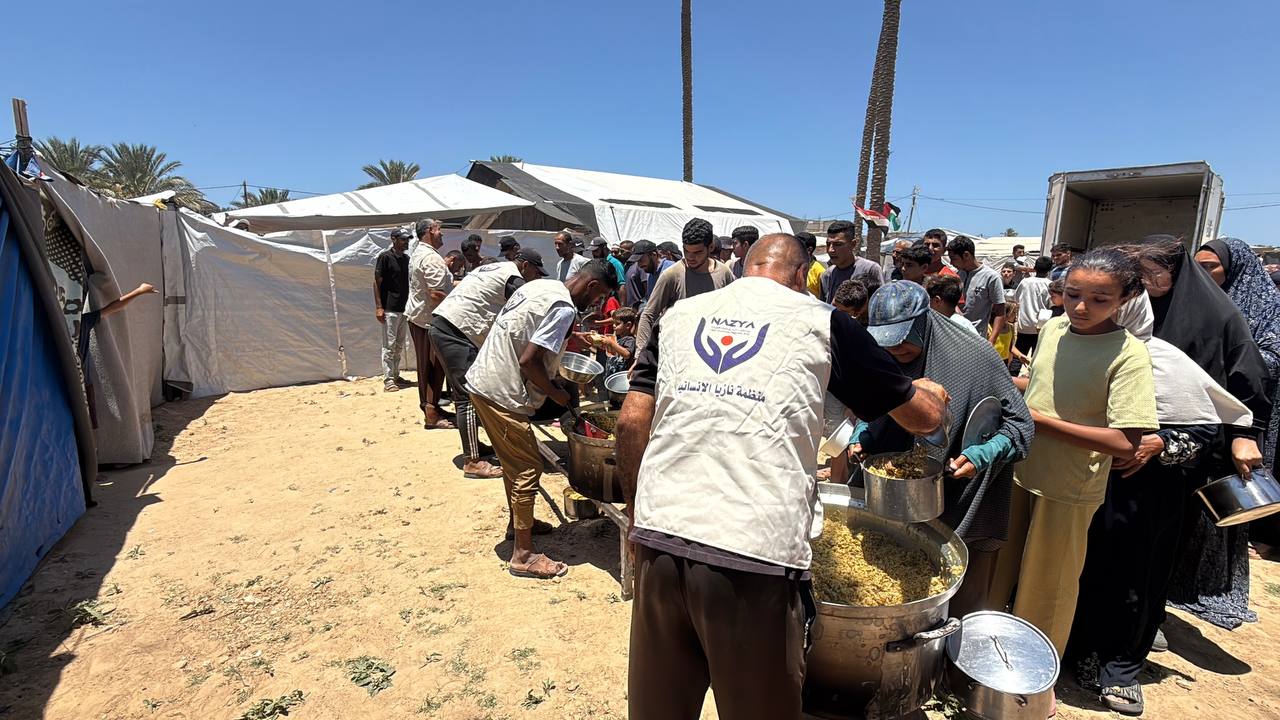 Nazya Humanitarian Aid food aid distribution for Palestinian families | delivering groceries, bread and essential food supplies to people in need in Palestine